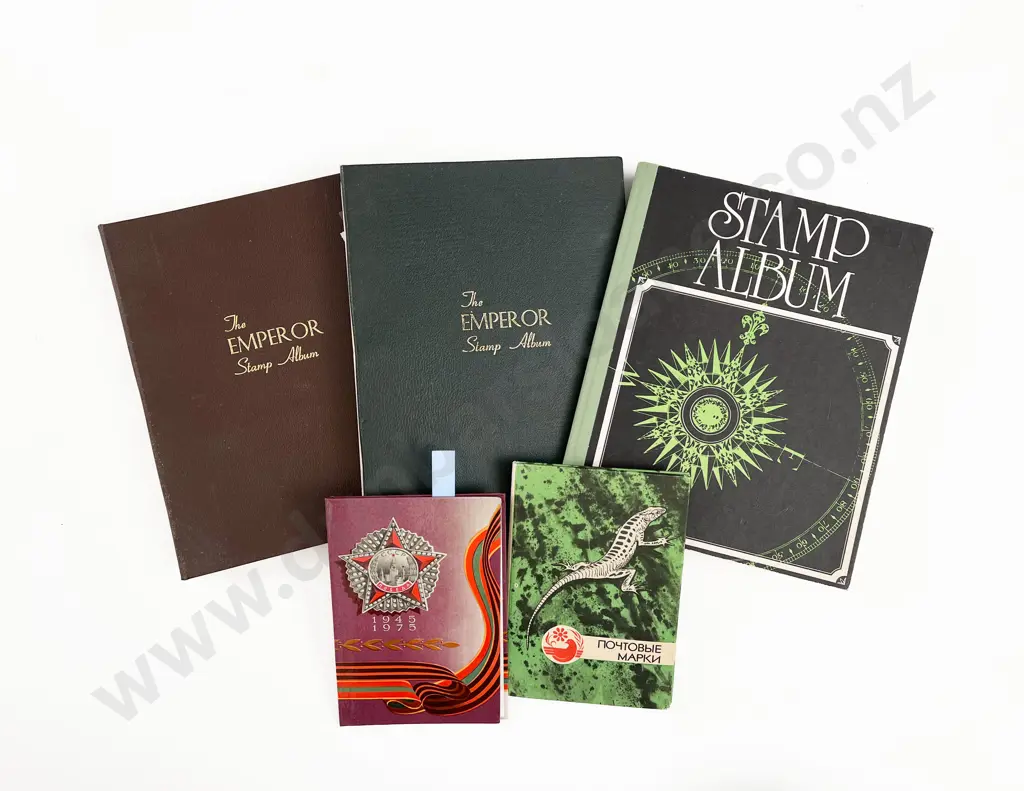 Three Small Vintage NZ and World Stamp Albums and two Russia books Image 1++