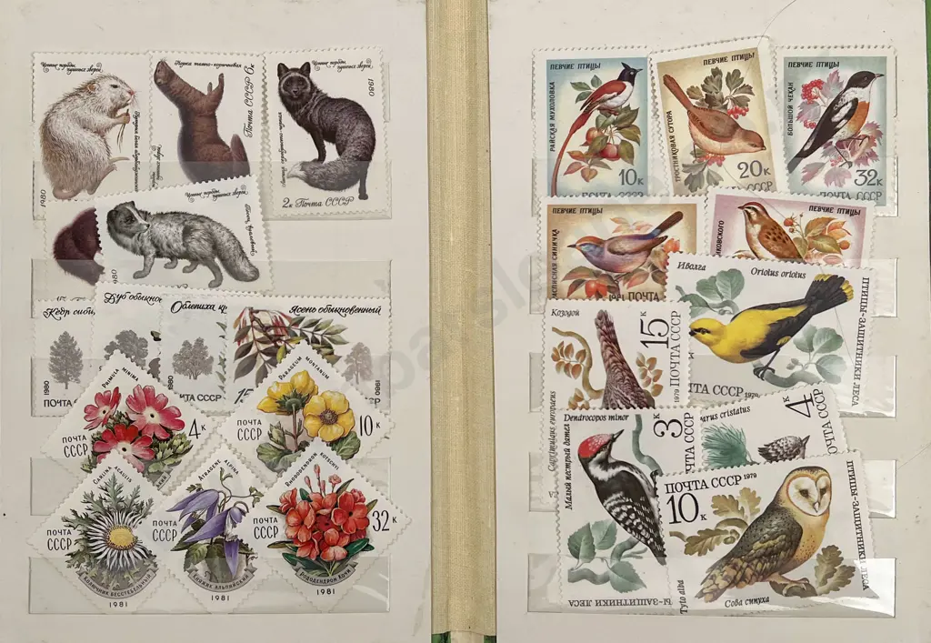 Three Small Vintage NZ and World Stamp Albums and two Russia books Image 1++