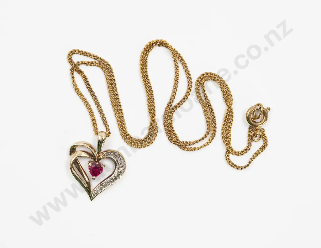 9ct Synthetic Ruby and Three Stone Diamond Heart Pendant Image 1++