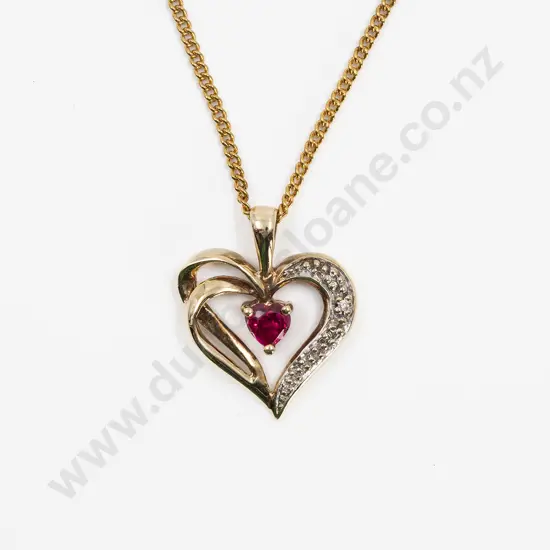 9ct Synthetic Ruby and Three Stone Diamond Heart Pendant