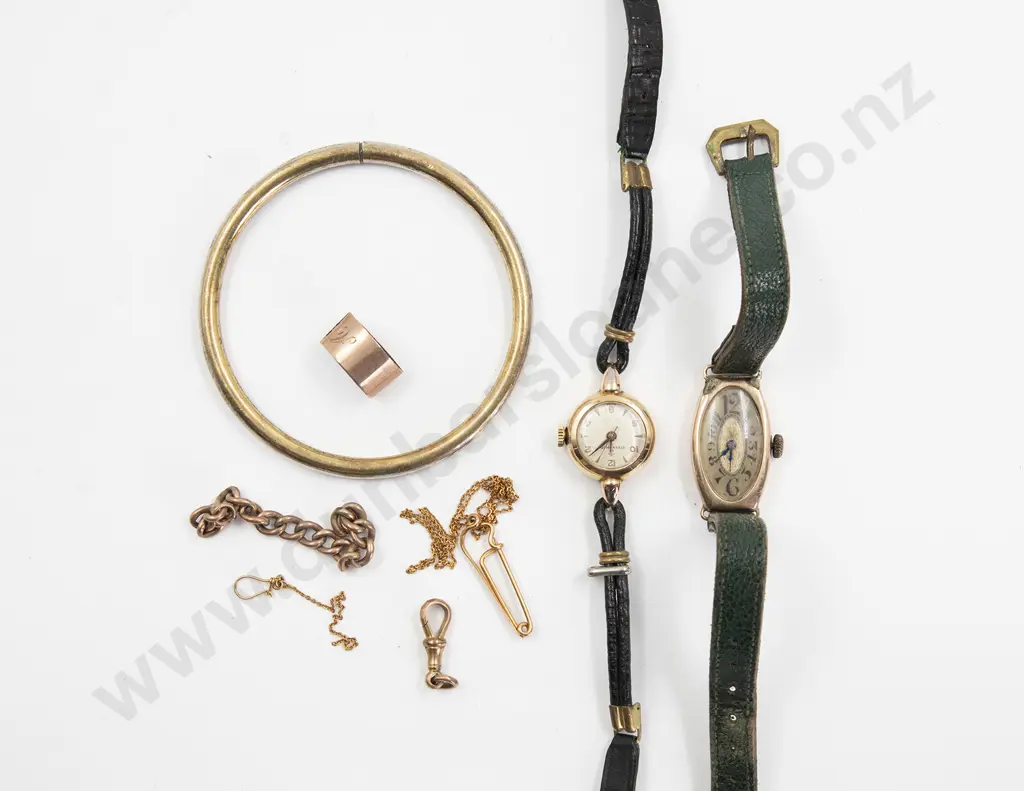 Early C20th 9ct Cased Wrist Watch. elongated oval dial with Arabic numerals (showing repairs to case not working) together with gold plated Eterna-Matic Ladies Wrist Watch and gold pieces of chain Image 1++