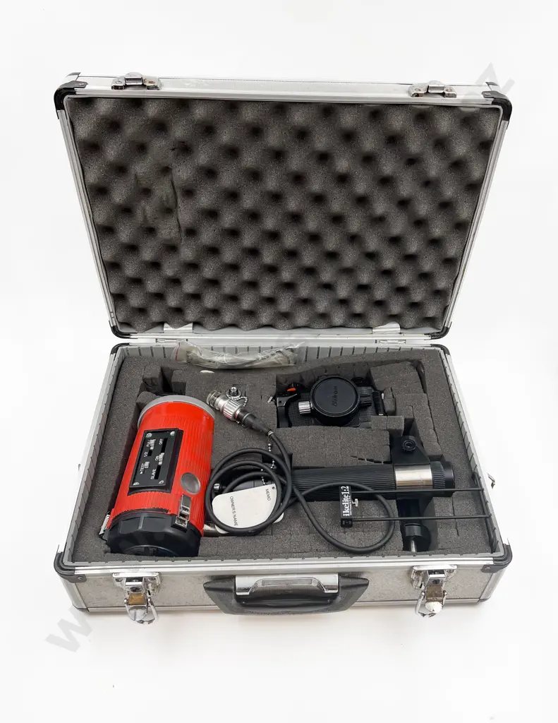 Case Including Nikon Camera and Tripod Image 1++