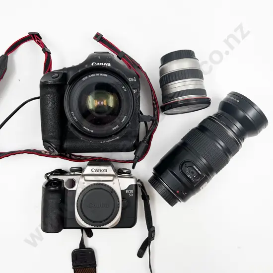 Two Cannon Cameras and Assorted Lenses in Carrying Bag