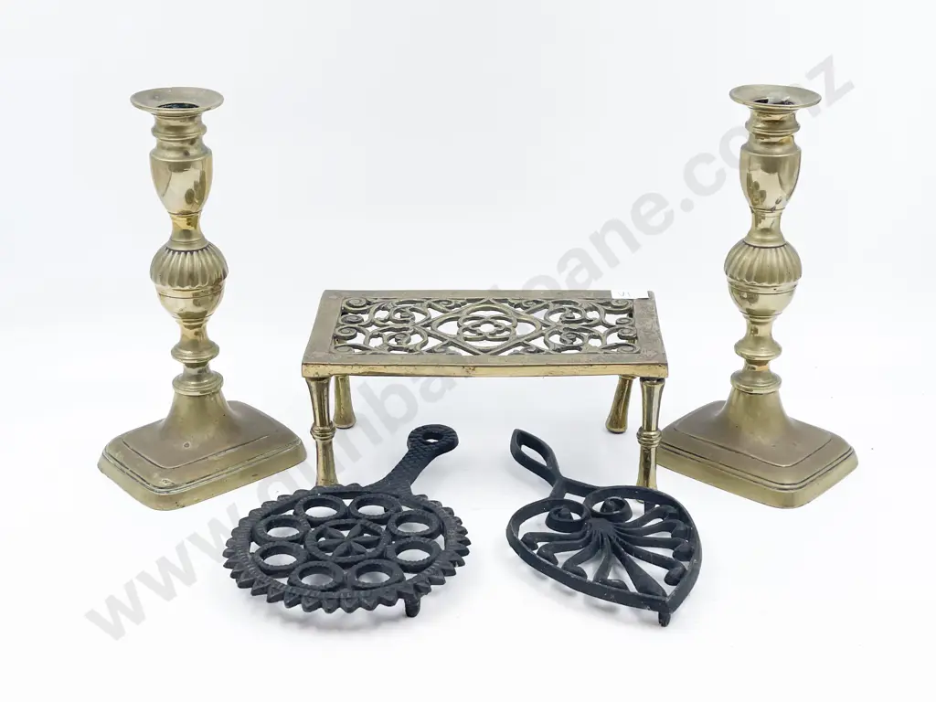 Pair of Brass Candlesticks and Three Assorted Trivets Image 1++