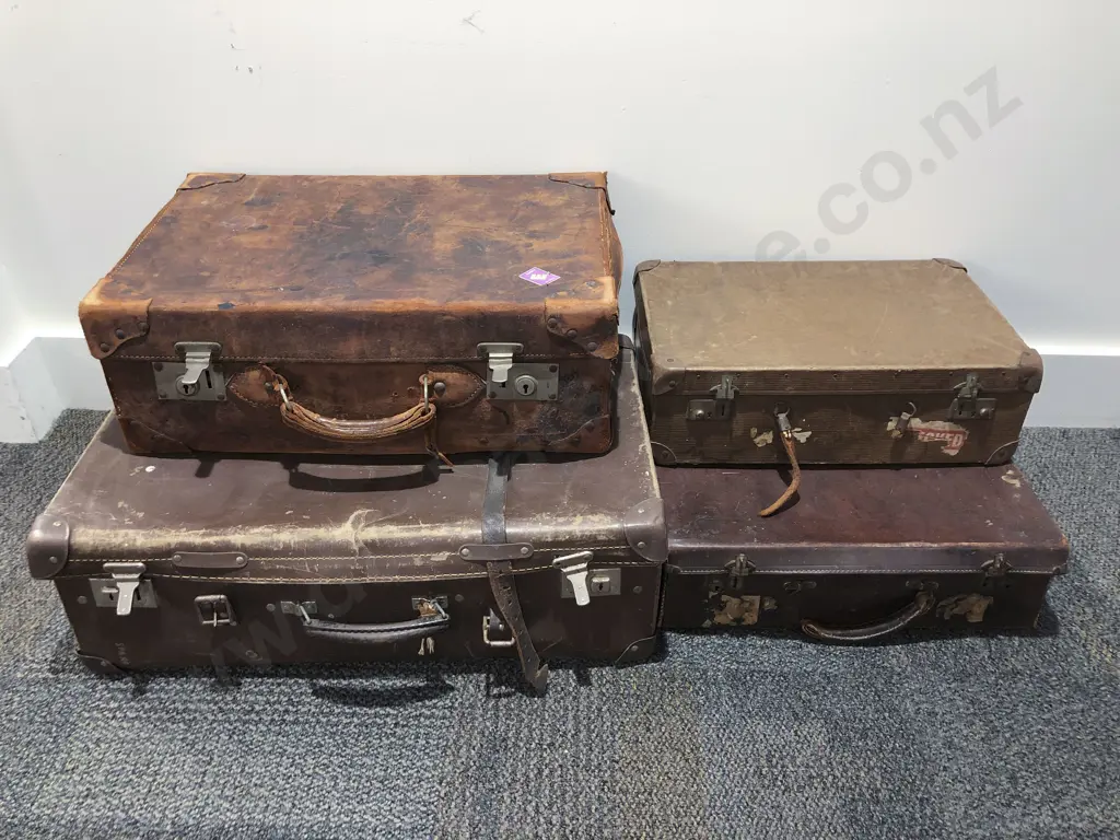 Four Vintage Suitcases Image 1++