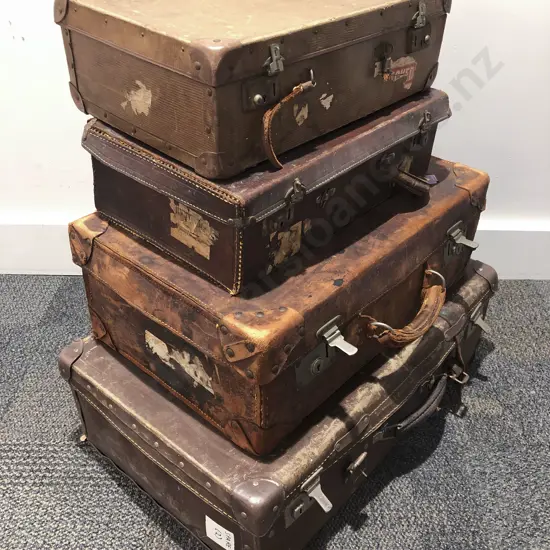 Four Vintage Suitcases