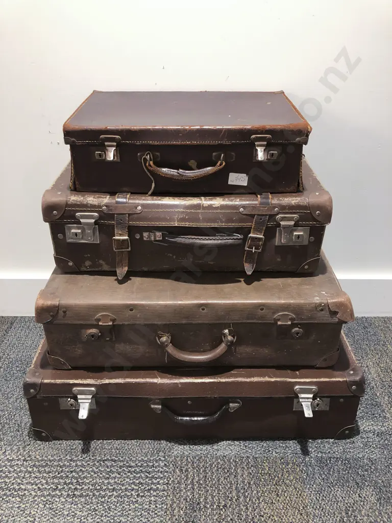 Four Vintage Suitcases Image 1++