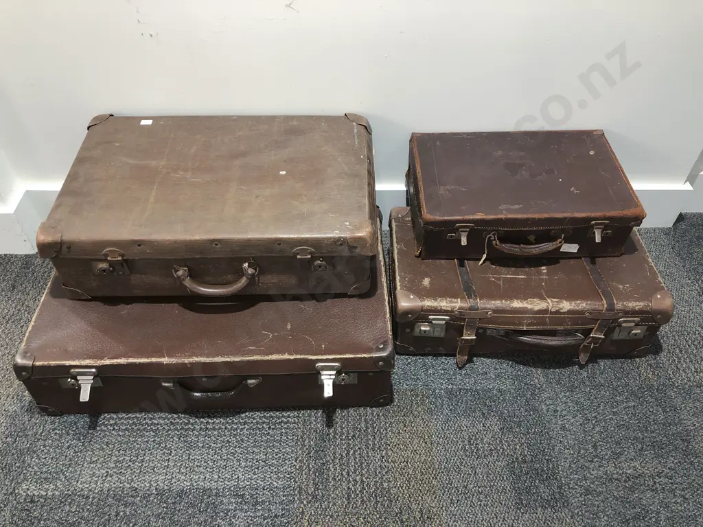Four Vintage Suitcases Image 1++