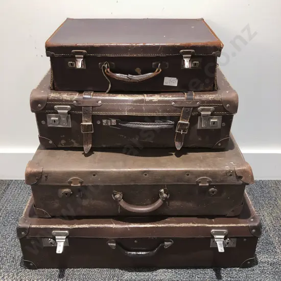 Four Vintage Suitcases