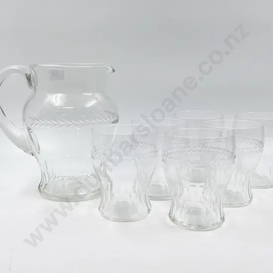 Glass Jug and Six Matching Records
