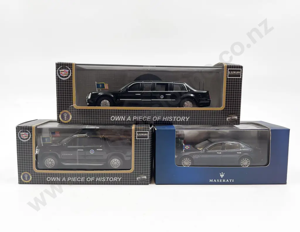 Three Assorted Diecast Model Cars Image 1++