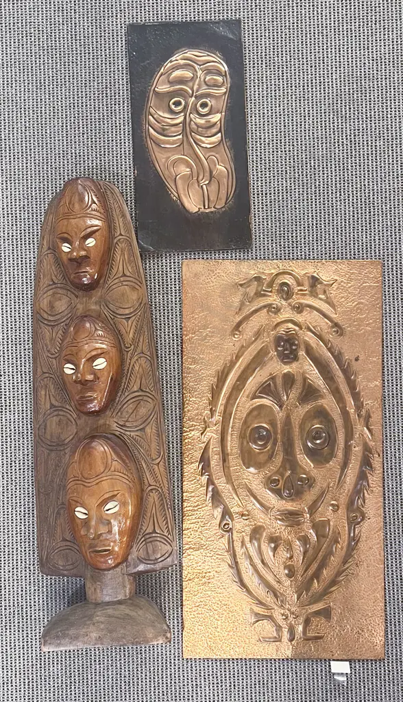 Two Copper Wall Hangings with Tribal Carving Image 1++