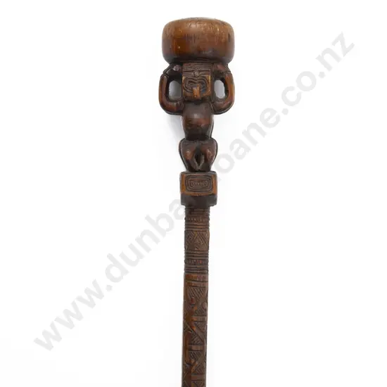 A Late 19th Century Maori Carved Tokotoko/Orators Stick With Stylised FiguresThe handle with two stylised figures standing back-to-back below a compressed bun