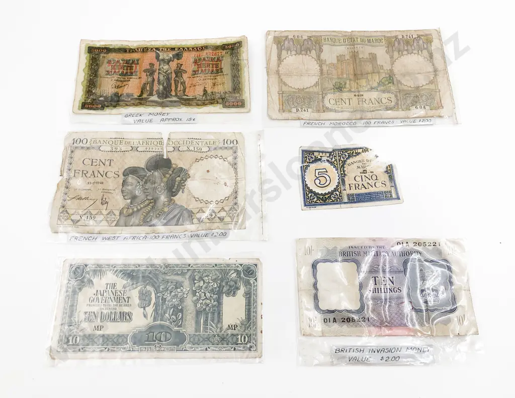 Quantity of Assorted Commemorative Coins and Assorted Bank Notes etc Image 1++