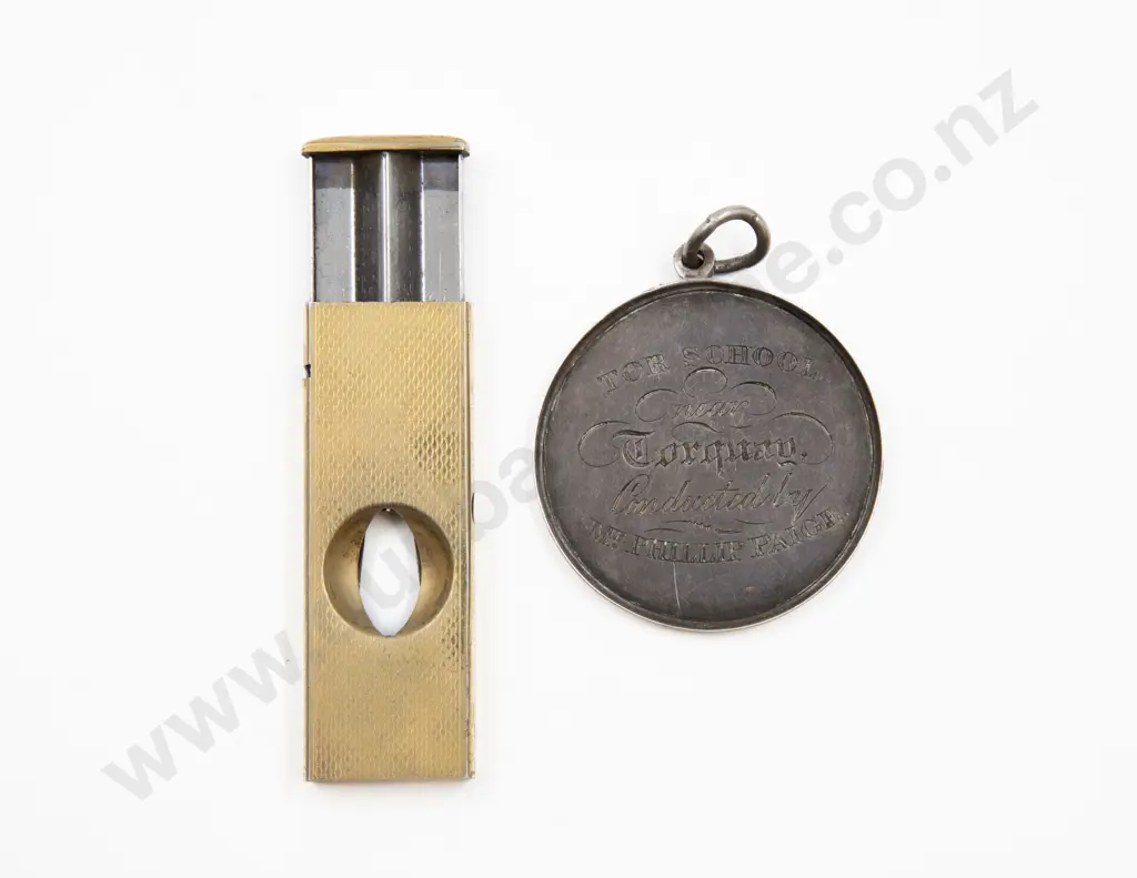 Pocket 'V' Cigar Cutter and s/s prize medallion for Penmanship dated 1841 Image 1++