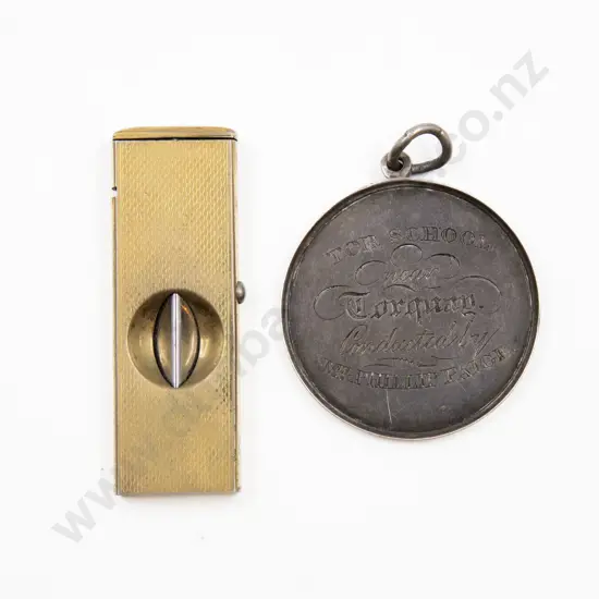 Pocket 'V' Cigar Cutter and s/s prize medallion for Penmanship dated 1841