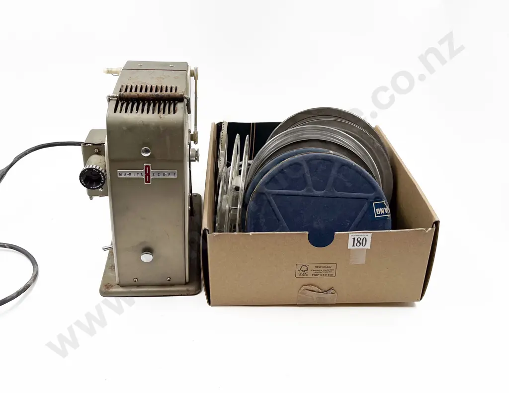Mamiya Movie Projector together with Movie Film Reels incl. Disney Image 1++