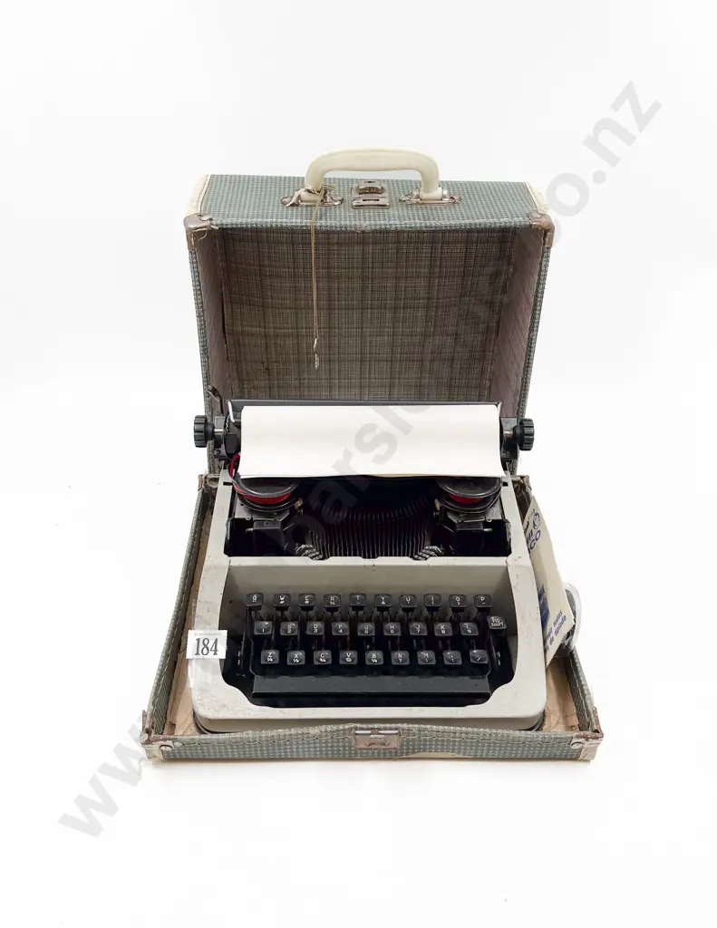 Small Vintage Portable Typewriter Image 1++