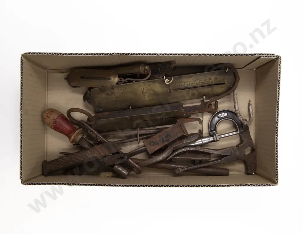 Collection of Balance Weights and Various Tools Image 1++