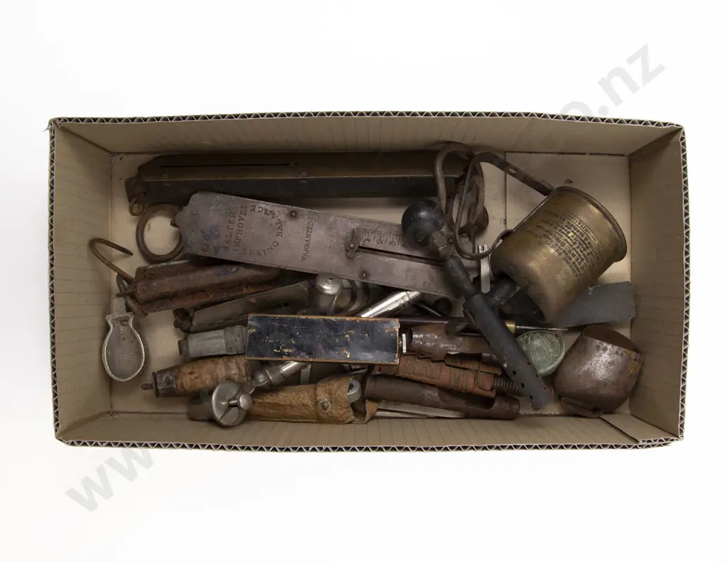 Collection of Balance Weights and Various Tools Image 1++