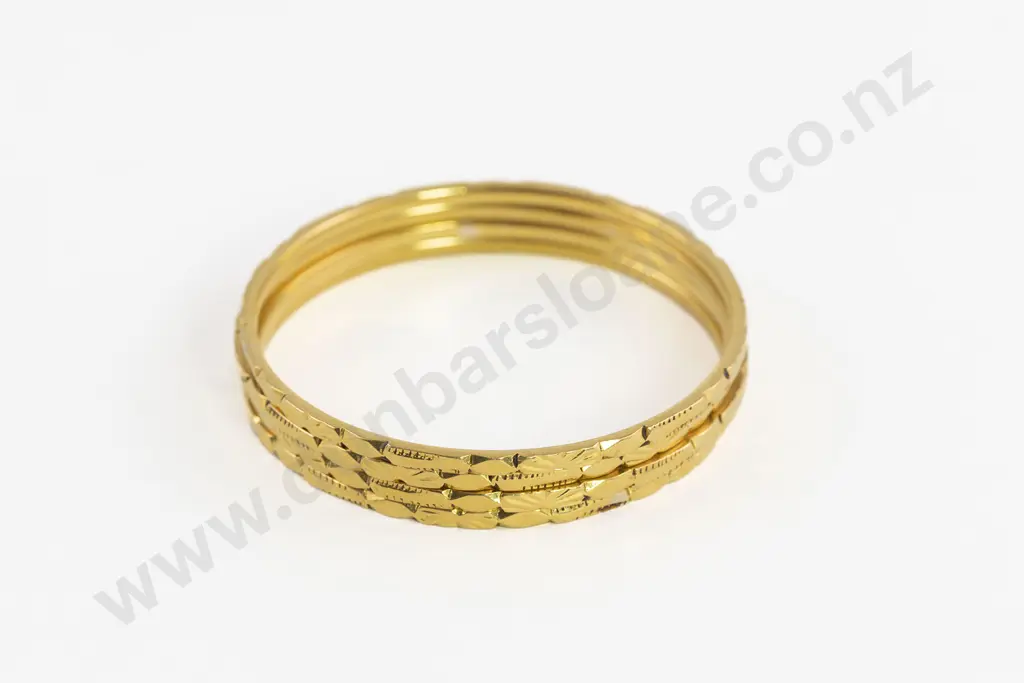 Four 24/22ct Bangles Image 1++