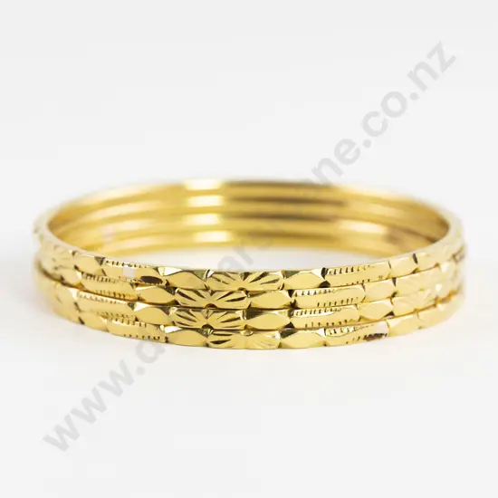 Four 24/22ct Bangles