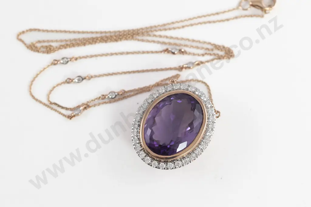 10ct Rose Gold Amethyst and Diamond Halo Pendant Necklace. The pendant's centre features Image 1++