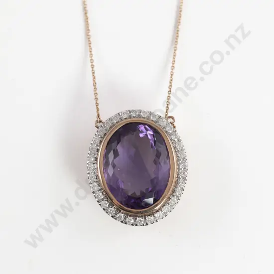 10ct Rose Gold Amethyst and Diamond Halo Pendant Necklace. The pendant's centre features