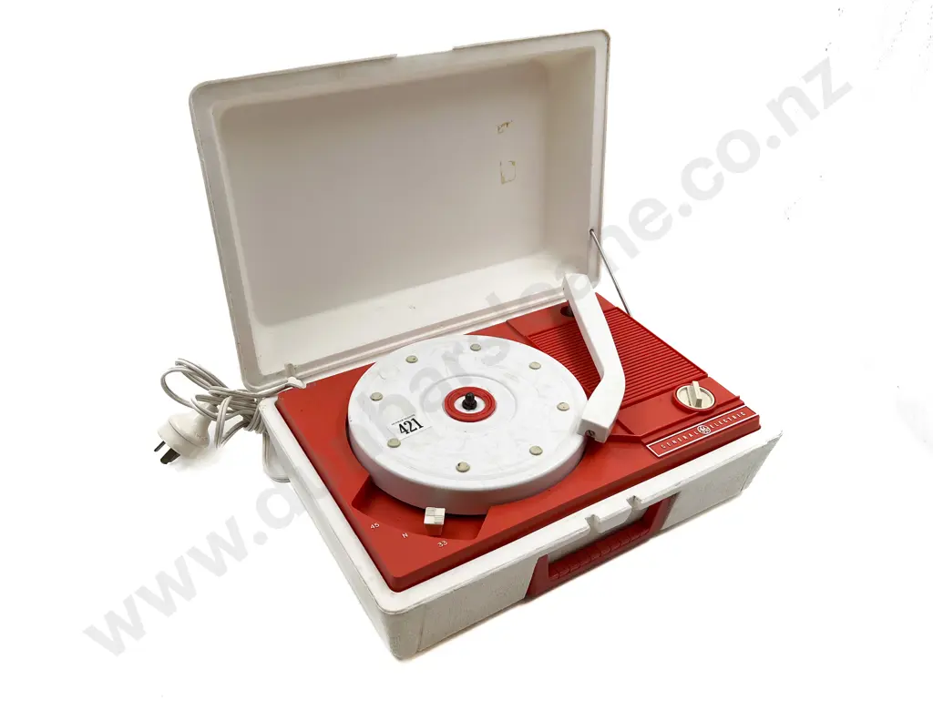 General Electric All Plastic Portable Record Player and Philips Image 1++