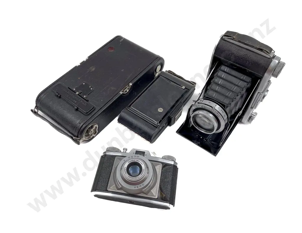 Four Vintage Cameras Image 1++