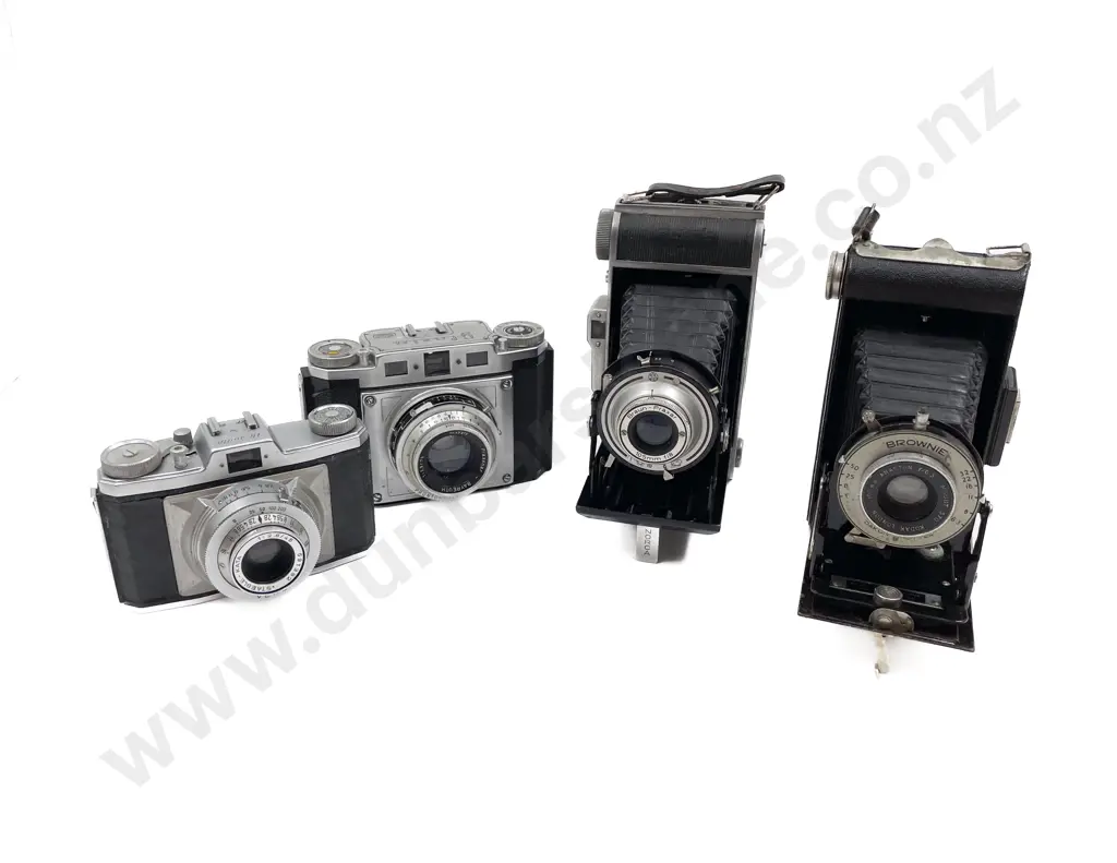Four Vintage Cameras Image 1++