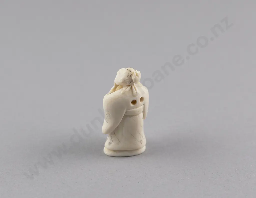 Signed Ivory Netsuke of a Standing Sage holding a Cup Image 1++