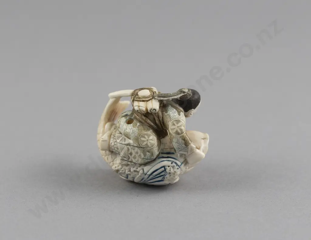 Signed and Stained Ivory Netsuke of an Immortal Kinko Riding a Giant Fish Image 1++