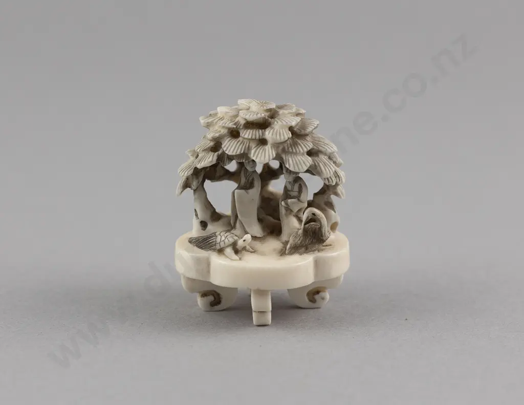 Signed Ivory Netsuke of a Garden Scene Image 1++