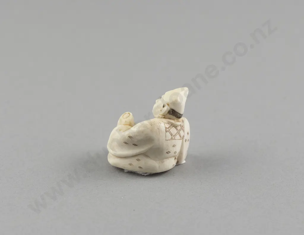 Signed Ivory Netsuke of a Reclining Immortal with Gourd Image 1++