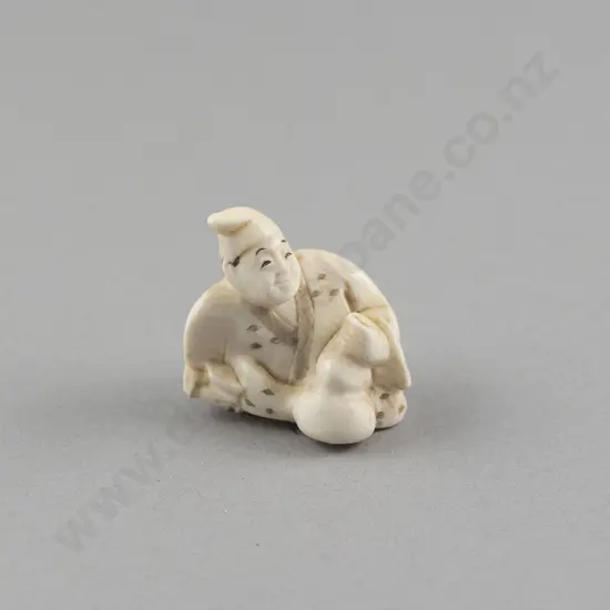 Signed Ivory Netsuke of a Reclining Immortal with Gourd