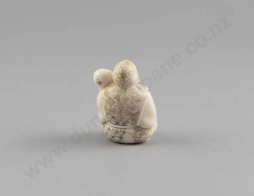 Signed Ivory Netsuke of a Doll Maker Image 1++