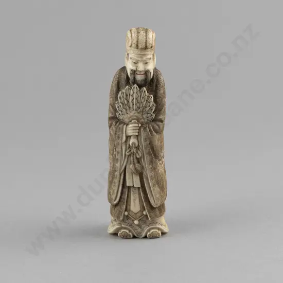 Carved and Stained Ivory Standing Noble Holding Fan