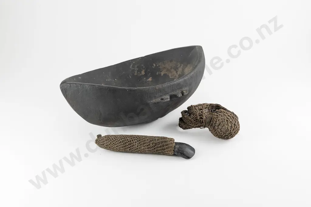 A Papua New Guinea Sepik River Shaman's Bowl together with a  Baliem Finger Cutting Tool Image 1++