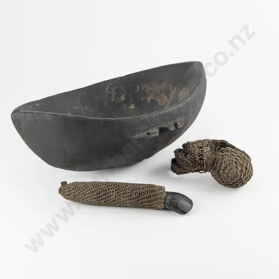 A Papua New Guinea Sepik River Shaman's Bowl together with a  Baliem Finger Cutting Tool
