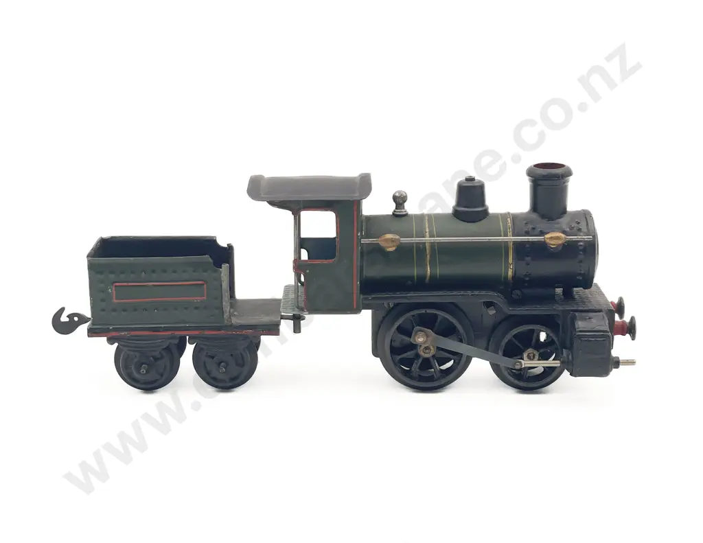Unidentified Early O Gauge Clockwork Locomotive and Tender Image 1++