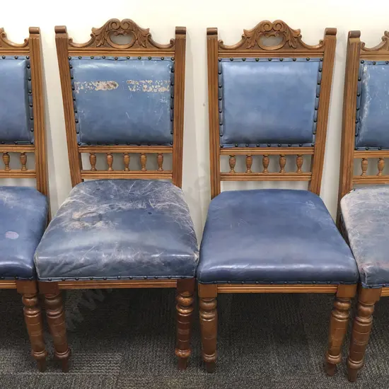 Four Leather Upholstered Dining Chairs