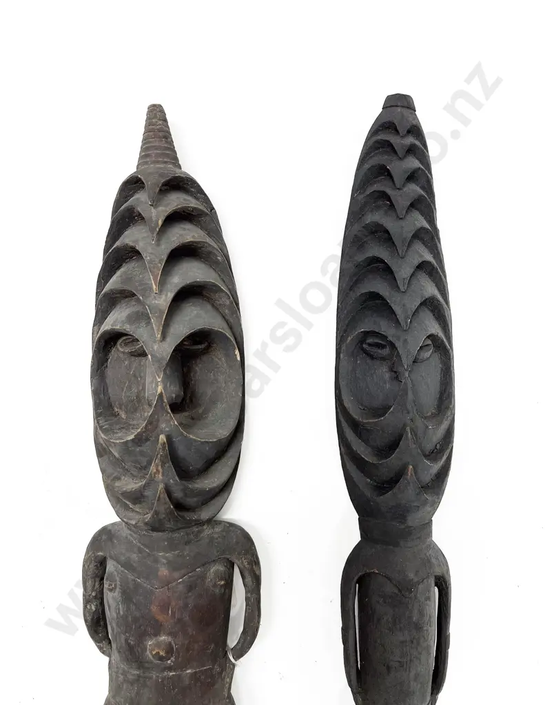 Two Standing Romkun Figures Image 1++
