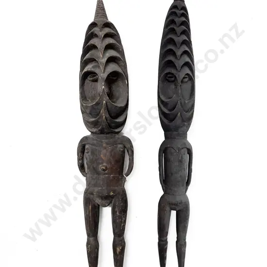 Two Standing Romkun Figures