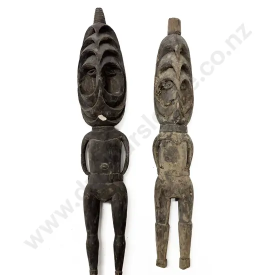 Two Romkun Standing Figures