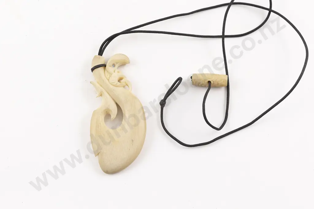Carved Bone Pendant With Manaia Head Image 1++