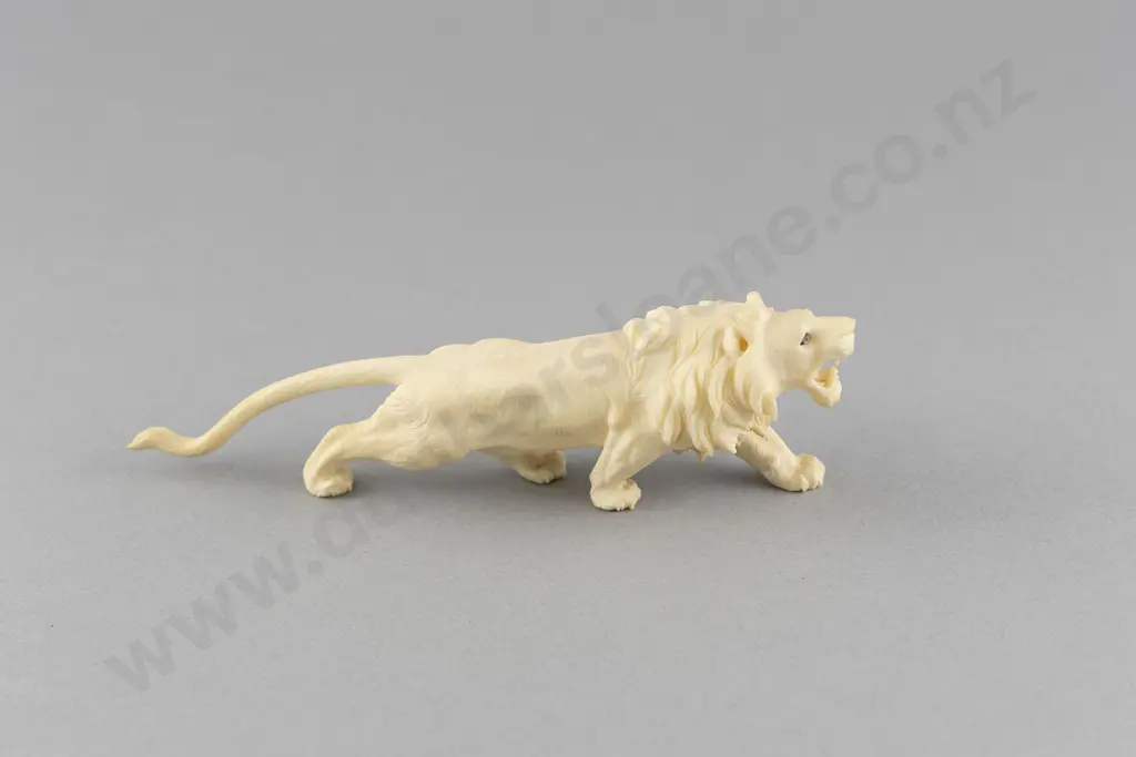 Carved Ivory Lion Ornament Image 1++