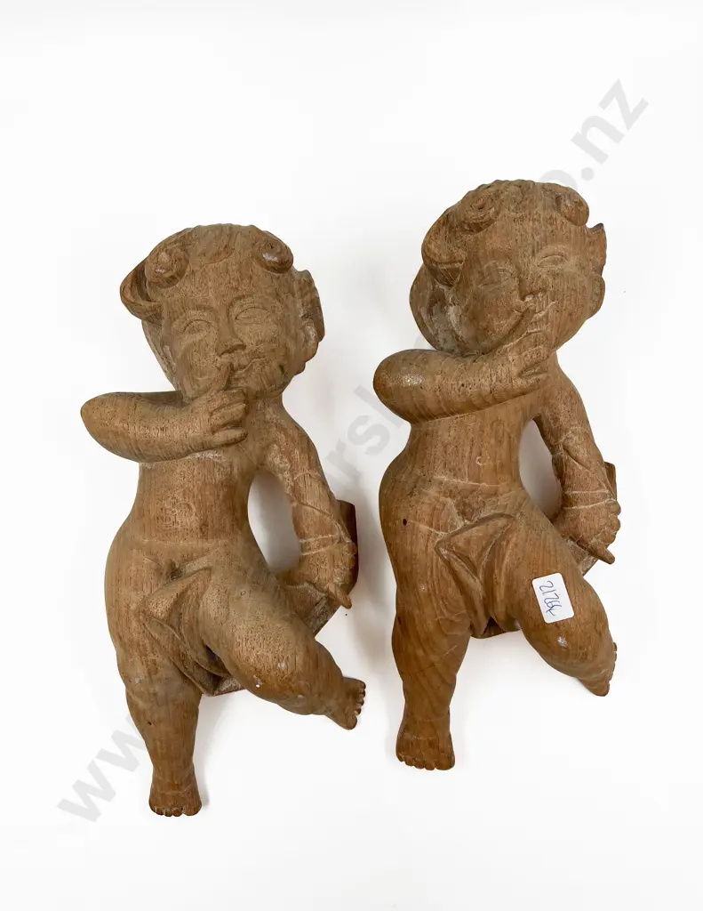 Pair of Carved Cherub Wall Hangings Image 1++