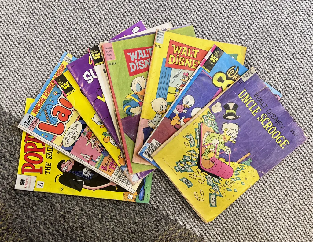 Eight Assorted Vintage Walt Disney Comics and Two Others Image 1++