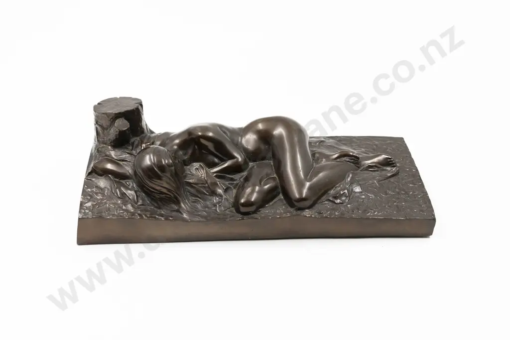 Bronze Of A Nude Sleeping By A Tree Stump Image 1++